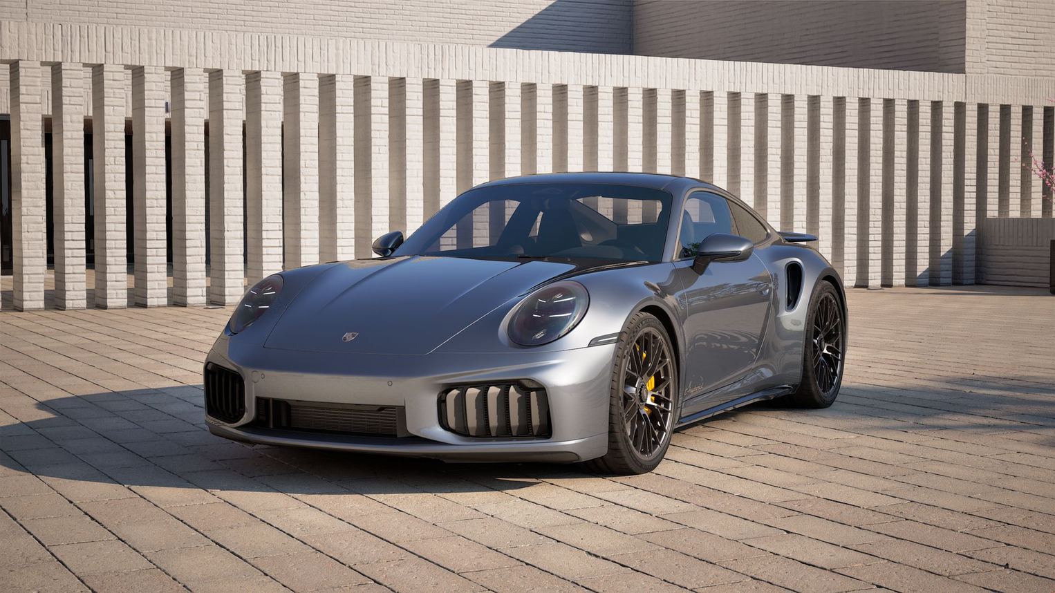 Dynamika torowa supersportowego samochodu Porsche 911 Turbo S na torze wyścigowym z widocznym przyspieszeniem w czasie startu